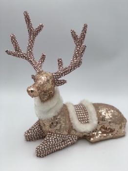 pink sequin reindeer sitting