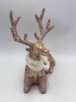 pink sequin reindeer sitting