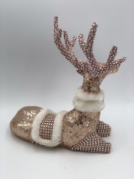 pink sequin reindeer sitting